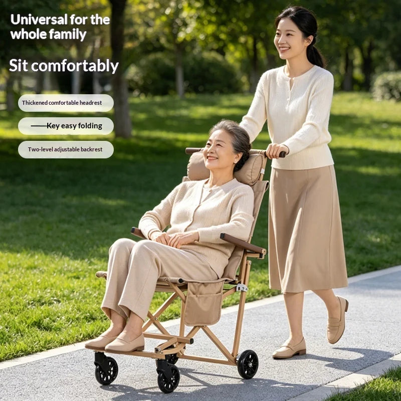 A beige folding wheelchair with a seat and push handle is shown outdoors on a paved path in a park, with an older woman seated in the wheelchair and a younger woman pushing it. Text on the left reads 'Universal for the whole family' and 'Sit comfortably' with feature callouts.